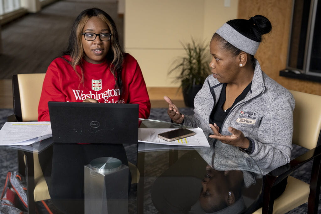 De'Ona Hardy, left, and Erica Jenkins study together.