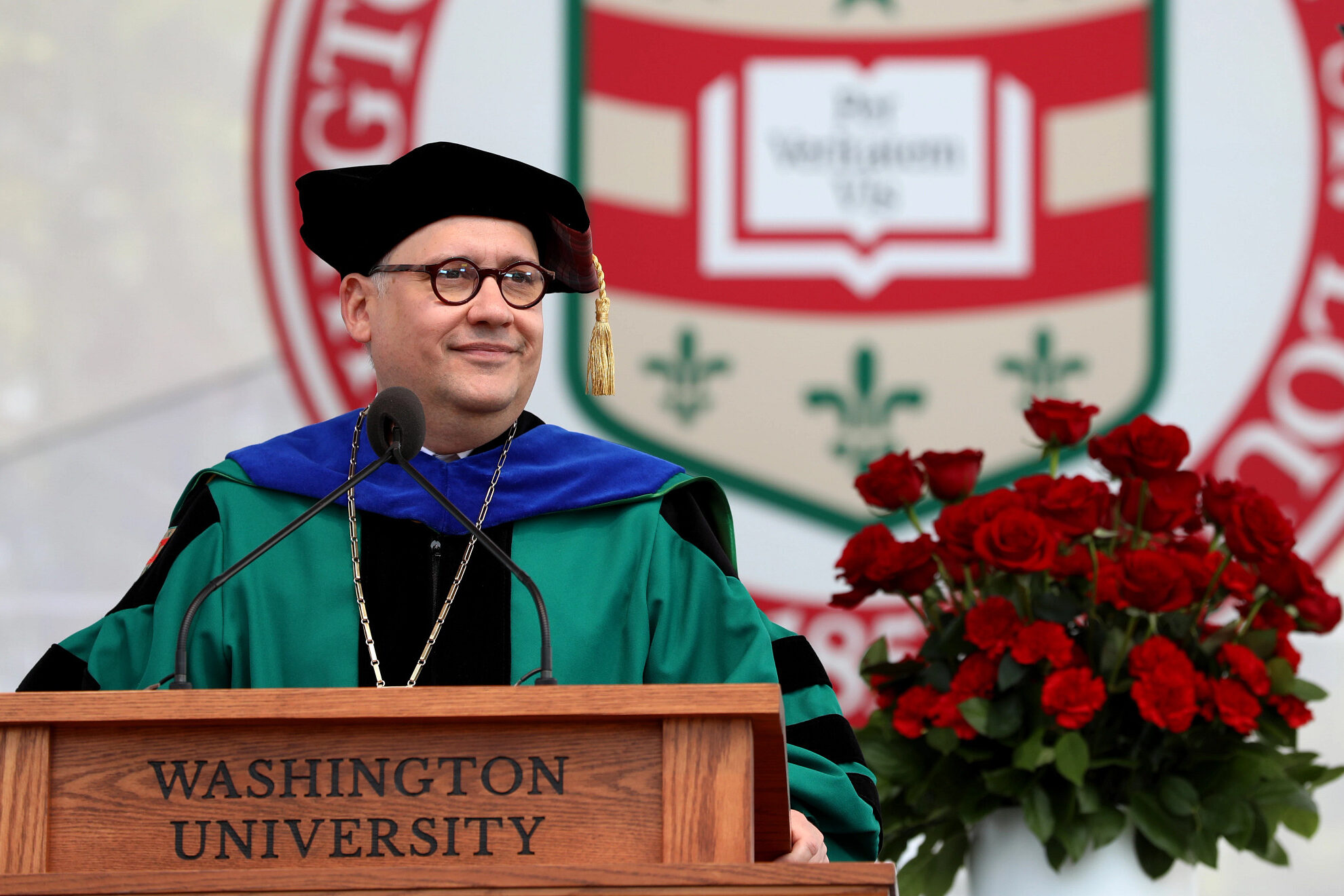 Chancellor Andrew D. Martin stands in front of a podium