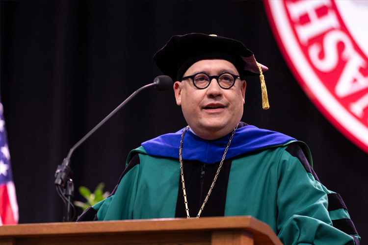 Chancellor Andrew Martin delivers speech at WashU's December Recognition Ceremony for 2024 graduates on the Danforth campus
